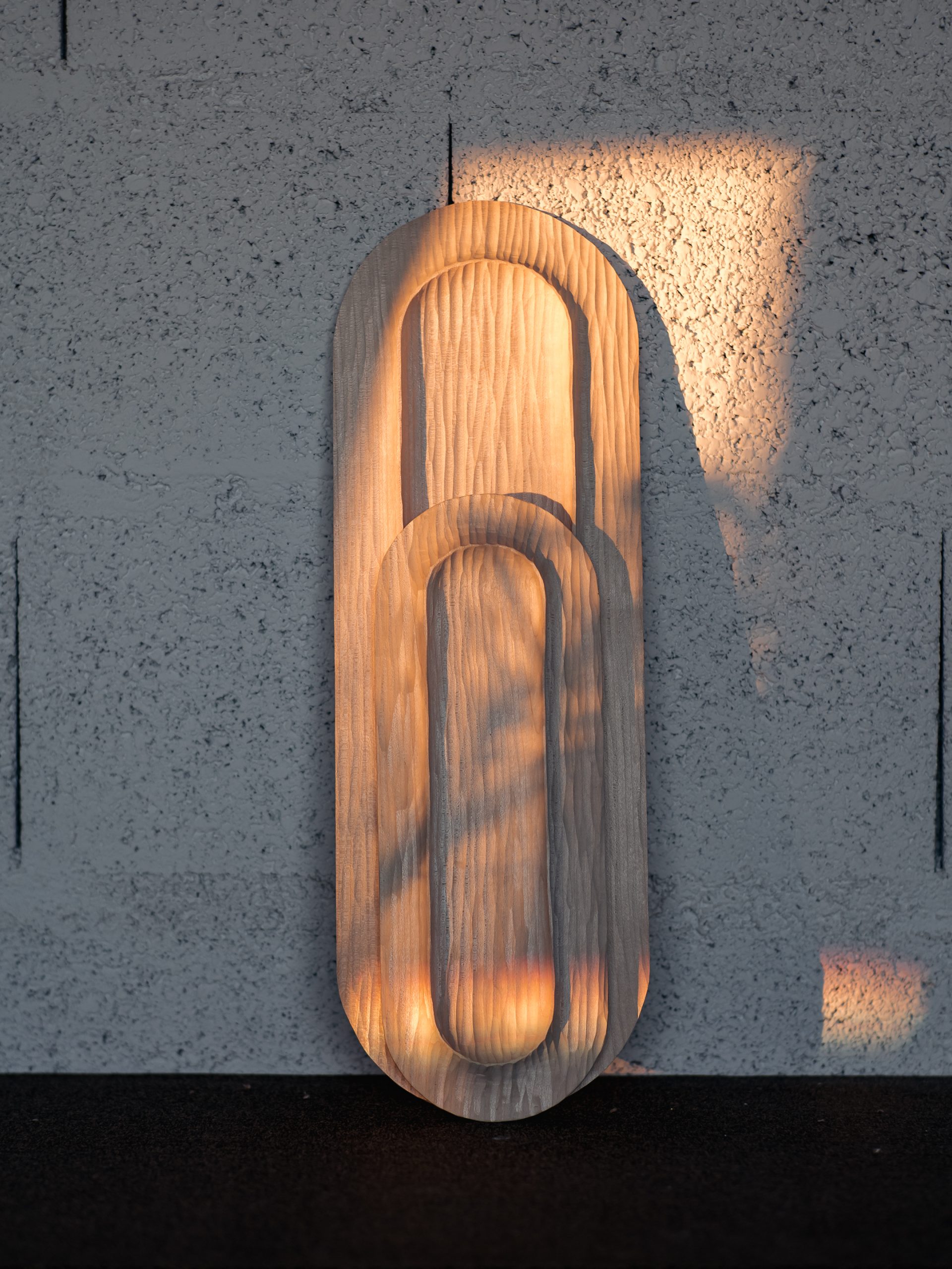sculpture d’un vide-poche en bois massif